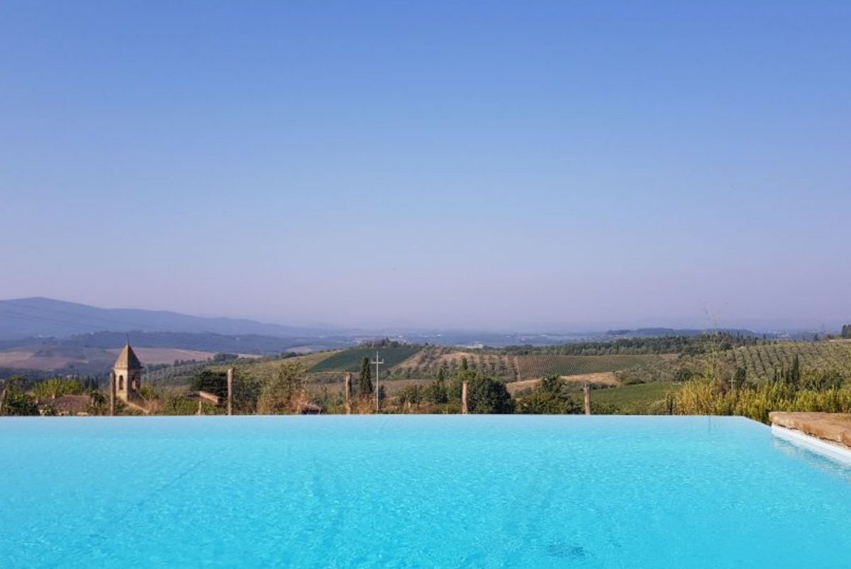 Infinity pool and Tuscan rolling hills
